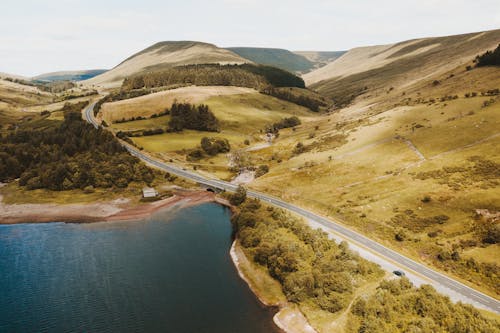 Aerial Photography of Roadway and Body of Water
