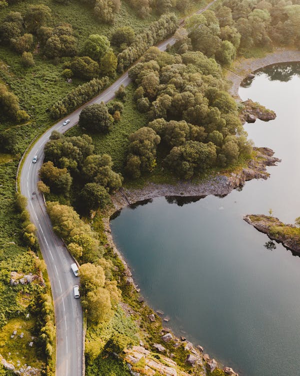 Aerial Photography of Roadway and Body of Water