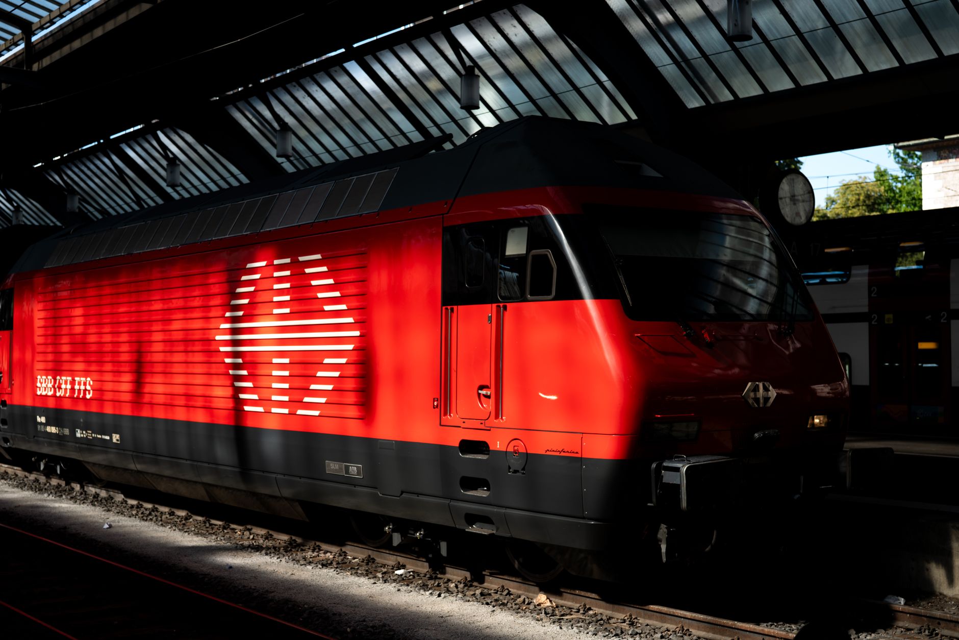 Red Swiss train at Zurich station for planning dog-friendly Europe rail routes