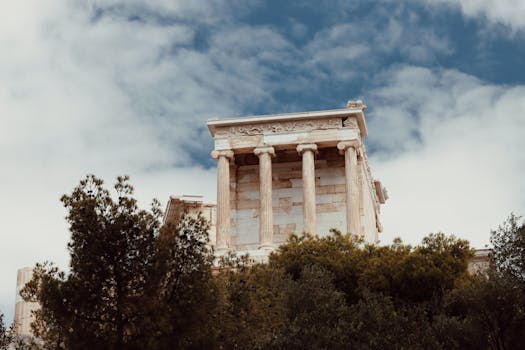 Majestic view of the Acropolis in Athens showcasing ancient Greek architecture and columns.