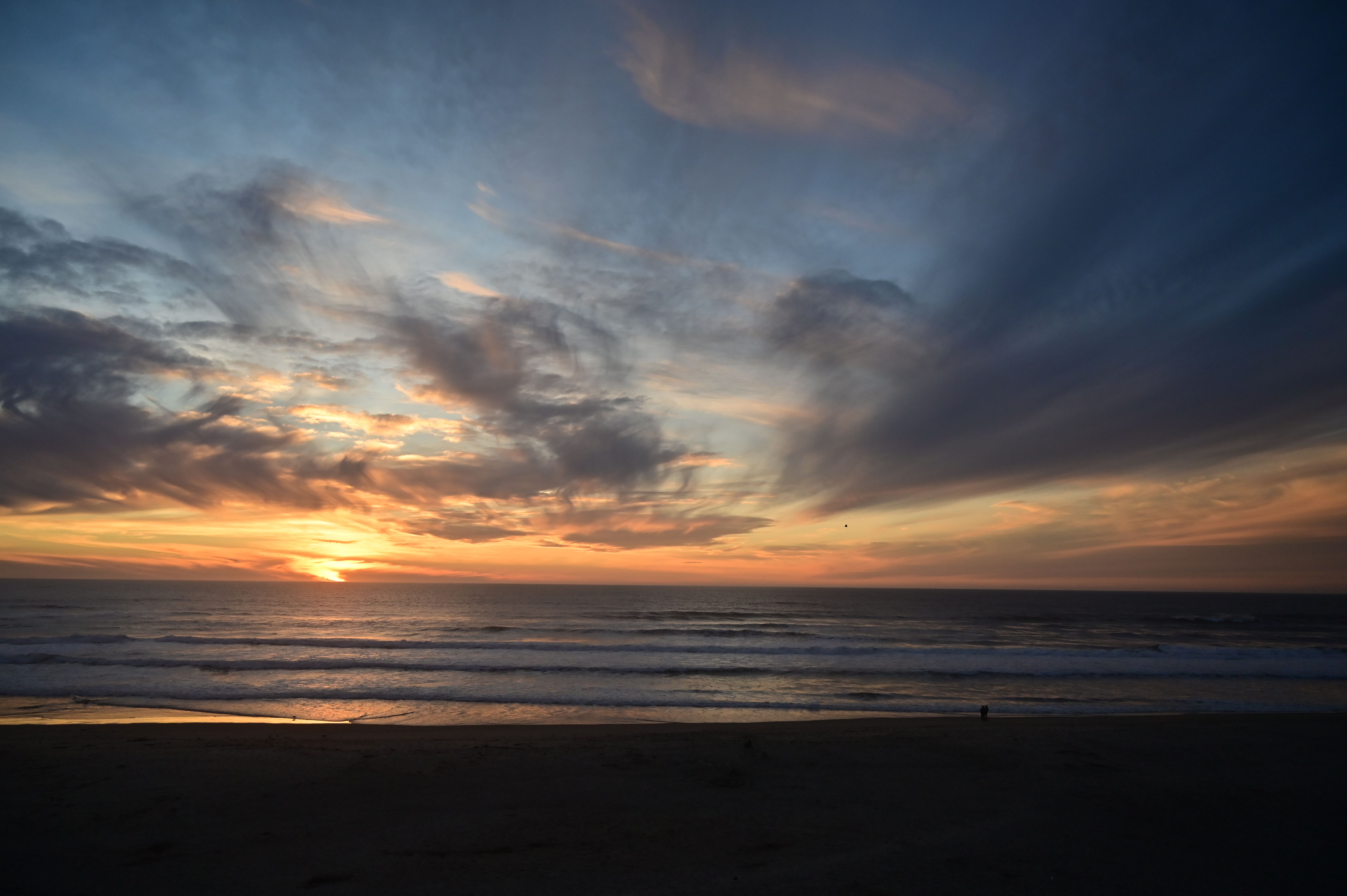 Stunning Ocean Sunset with Dramatic Clouds · Free Stock Photo