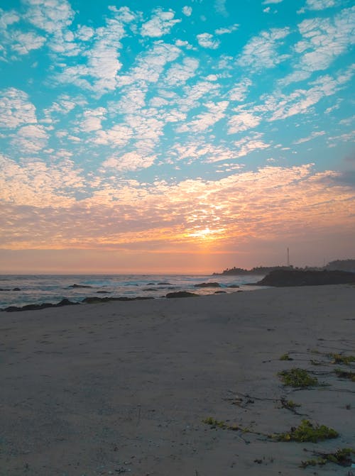 Free stock photo of beach, beautiful sunset, blue sky Stock Photo