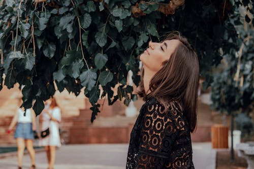 Photo Of Woman Wearing Black Top