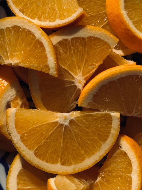 Free Close-up of fresh orange slices showcasing vibrant colors and juicy texture. Stock Photo