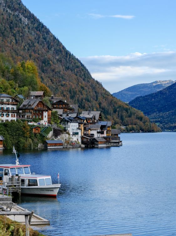 Scenic View of Hallstatt's Lakeside Village in Fall · Free Stock Photo