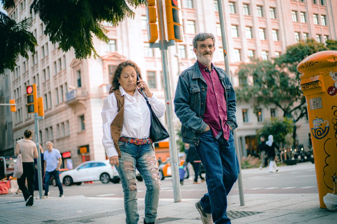 Street Scene with Pedestrians and Urban Background · Free Stock Photo