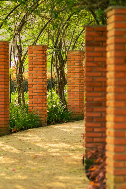 Brick Garden Columns with Greenery · Free Stock Photo
