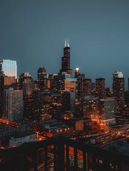 Stunning view of the Chicago skyline at twilight featuring the iconic Willis Tower.