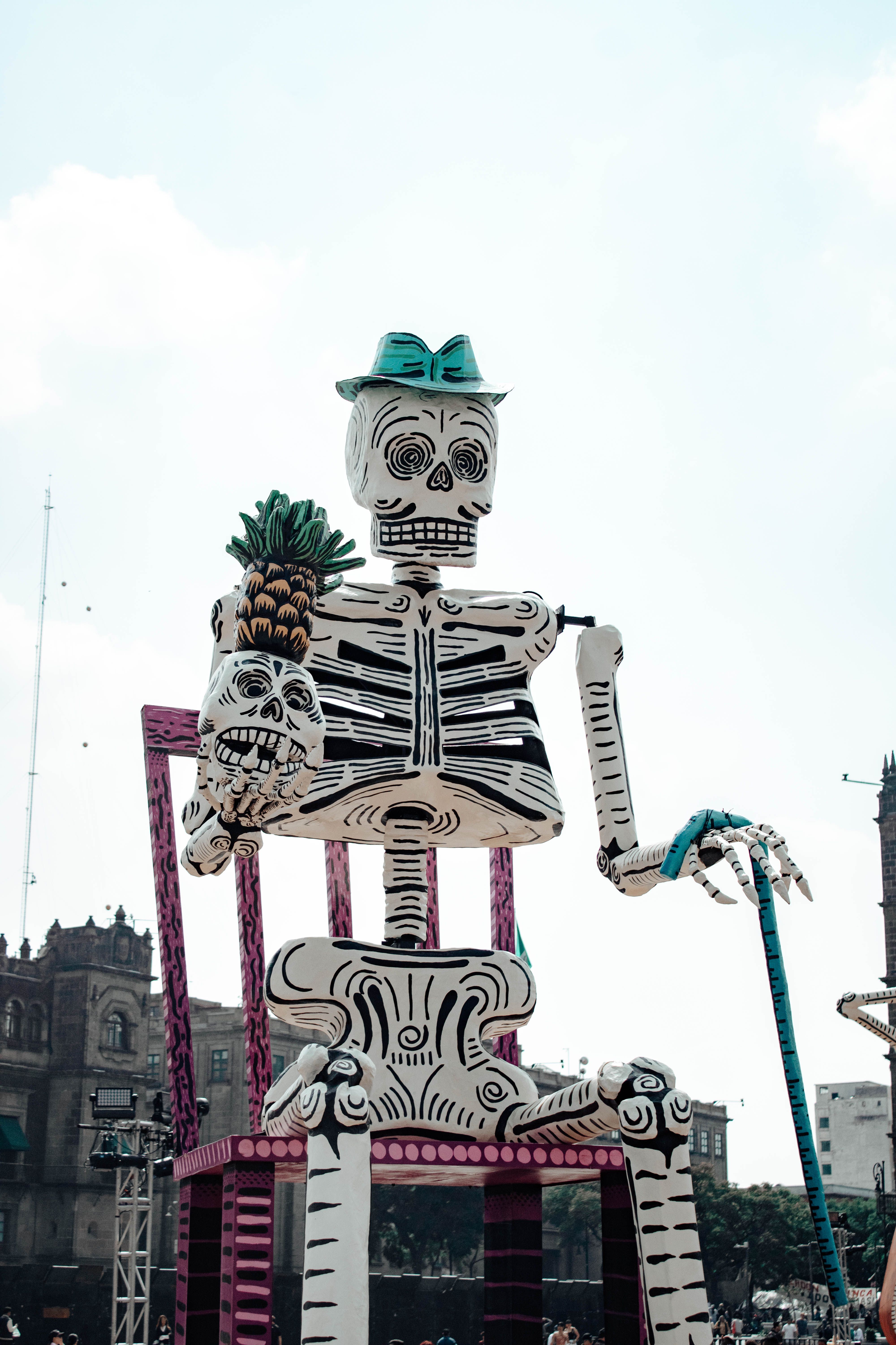 giant skeleton sculpture at day of the dead parade