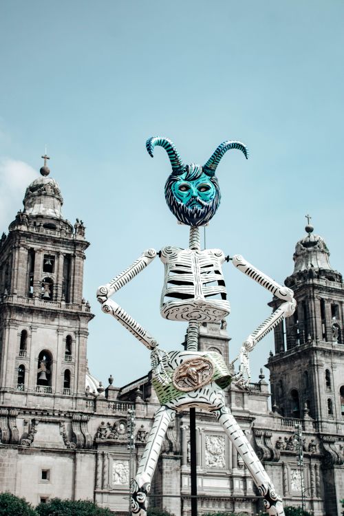 Free Skeletal sculpture celebrates Dia de Muertos in front of Mexico City Metropolitan Cathedral. Stock Photo