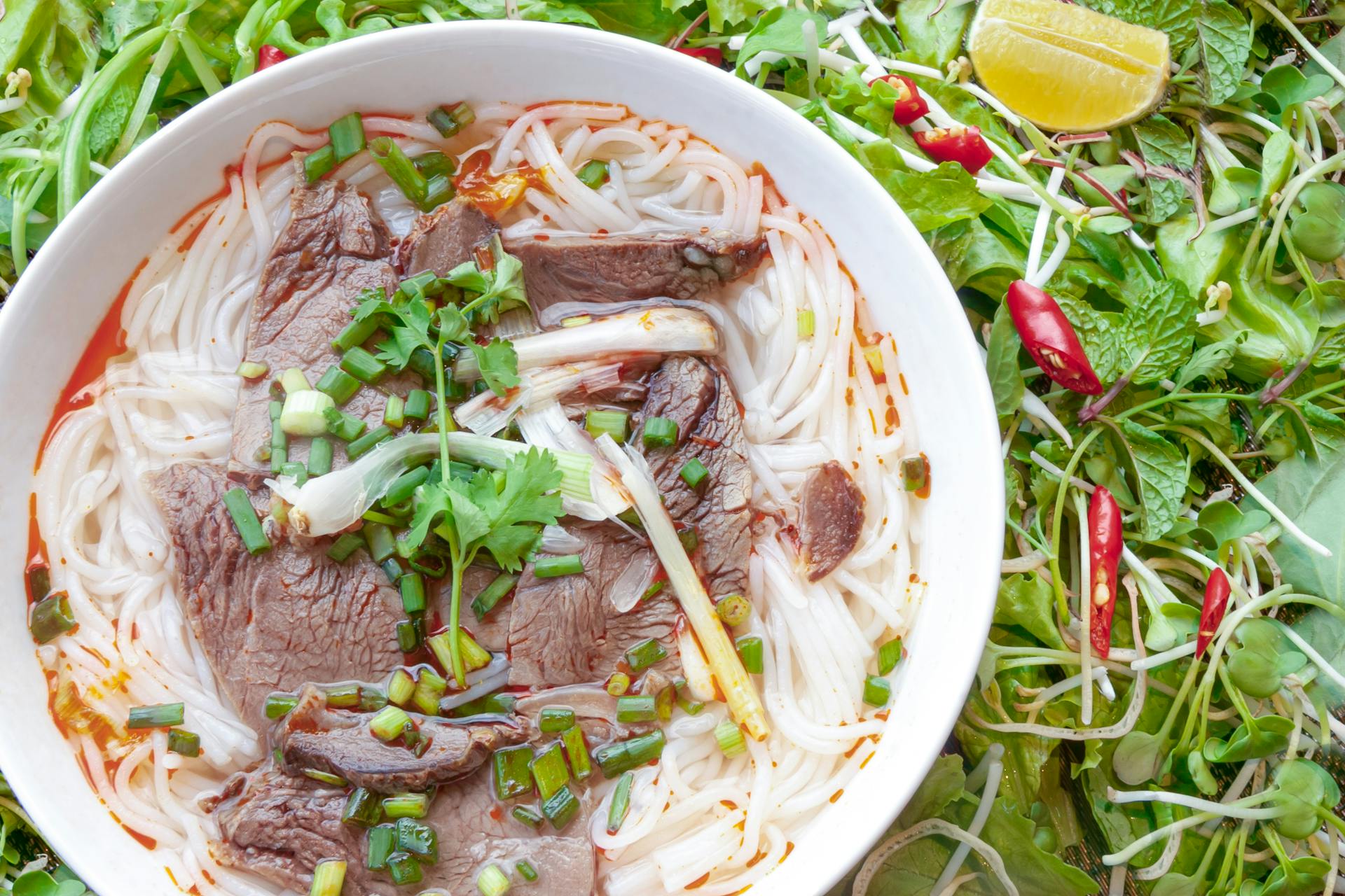 Vietnamese Traditional Dish with Lots of Vegetables around it