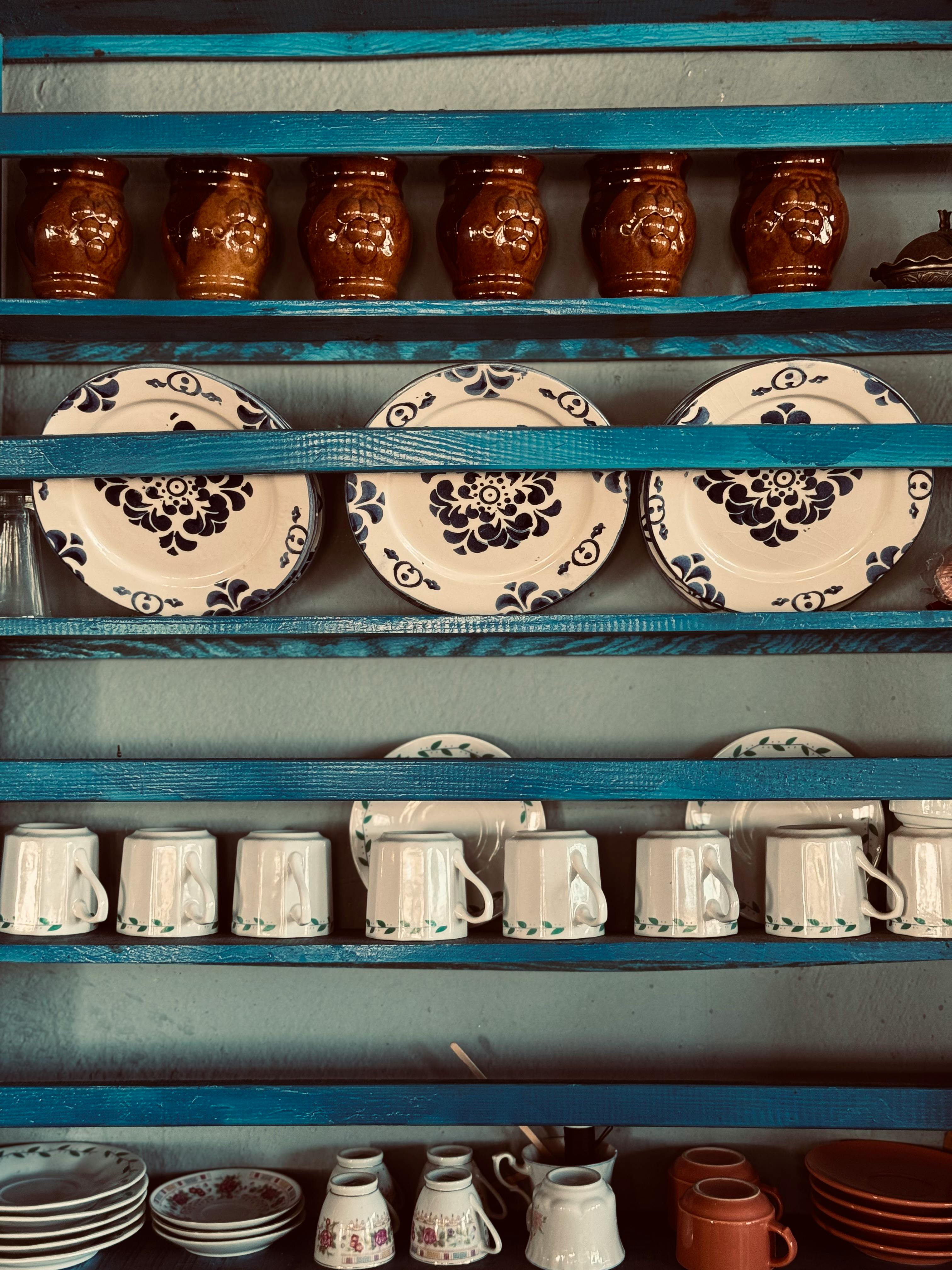 Rustic Kitchen Shelves with Ceramic Decor · Free Stock Photo