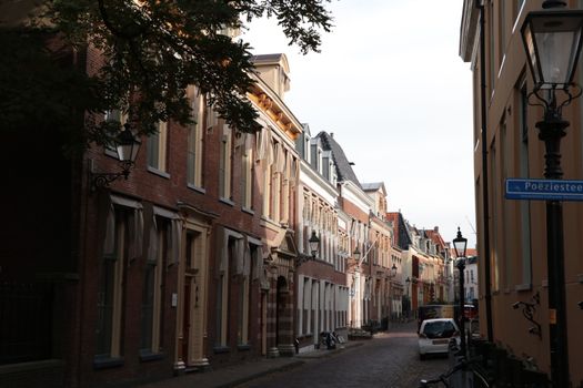 Charming historic street view of Leeuwarden, Netherlands, showcasing classic European architecture.