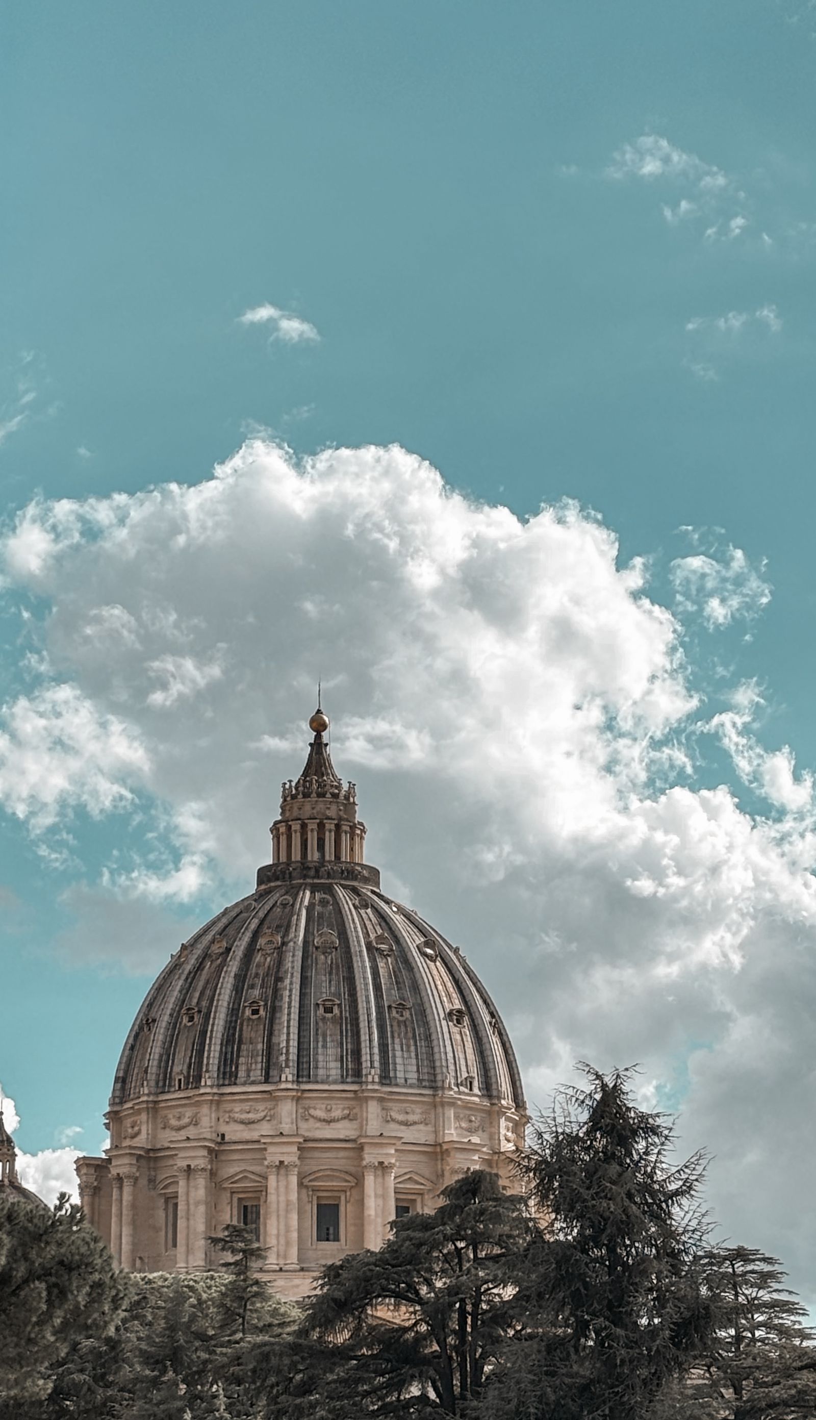 St Peter's Basilica's dome above St Peter's Square in the Vatican