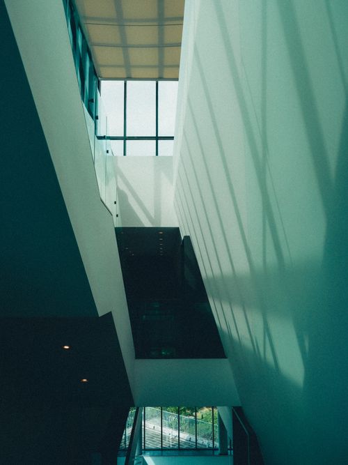 Free Contemporary building interior with striking light and shadows. Stock Photo