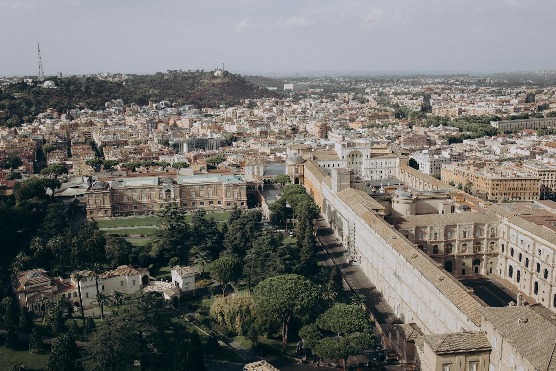 A breathtaking aerial view of Vatican City showcasing its stunning architecture and lush greenery.