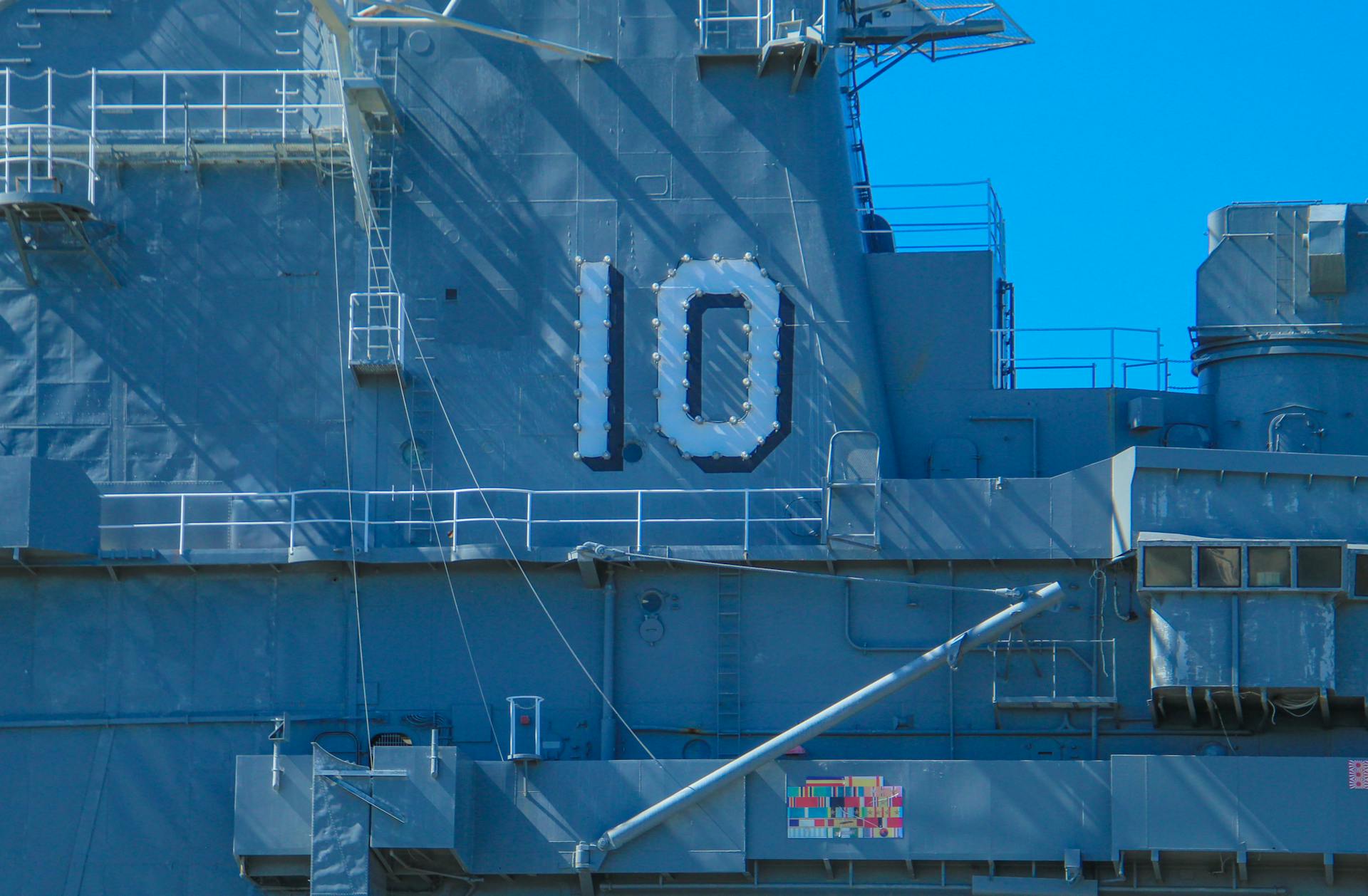 Close-up view of a naval ship showing the number 10 prominently on its structure.