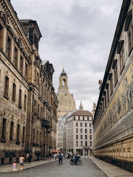 Explore the stunning architectural beauty of Dresden's iconic landmarks under a cloudy sky.