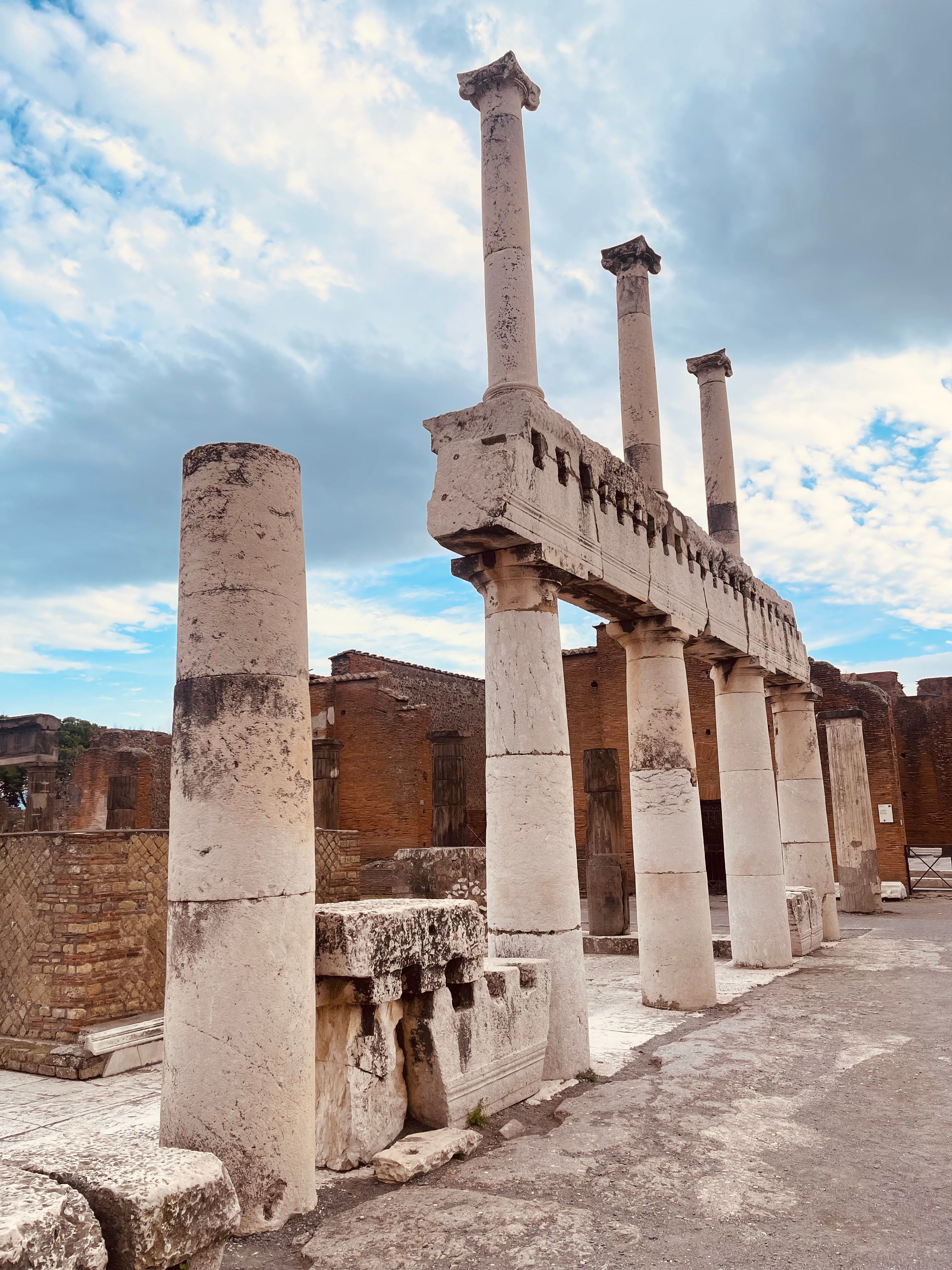 Ancient Roman Ruins with Pillars Under Blue Sky · Free Stock Photo