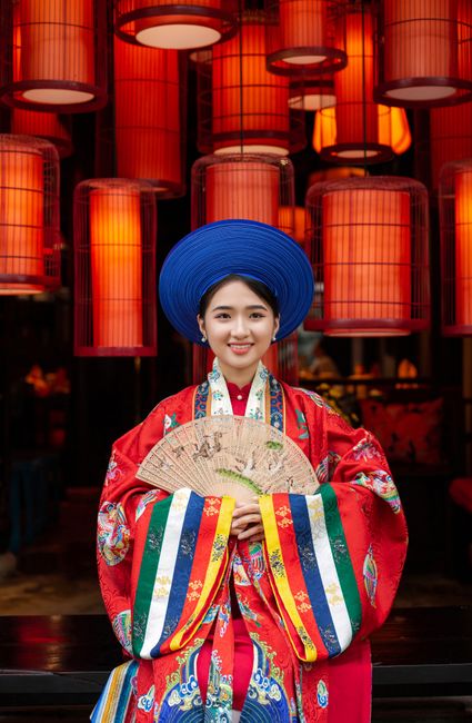 A vibrant portrait of a woman in traditional Vietnamese attire in Hội An.