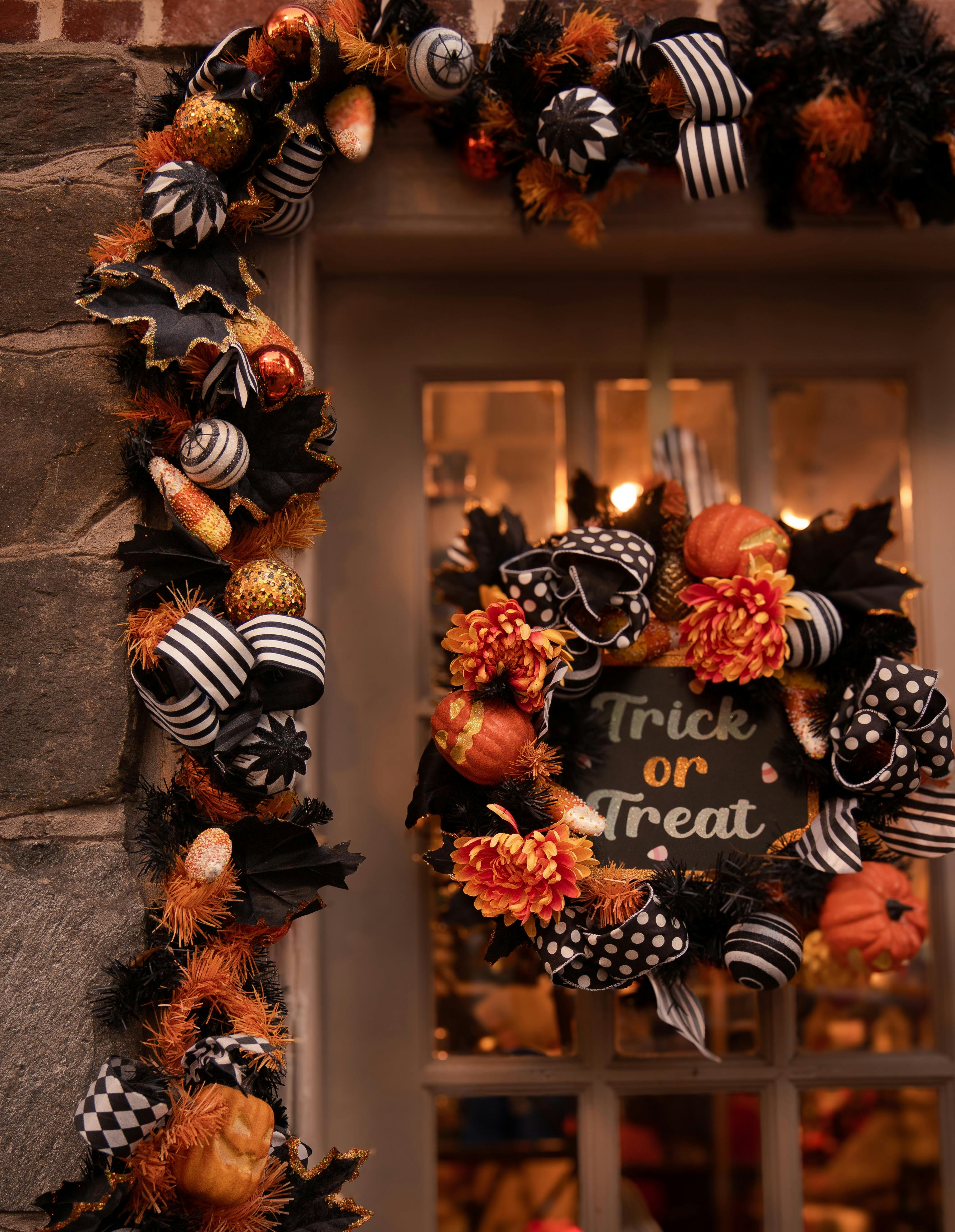 Colorful Halloween wreath with Trick or Treat sign on a door in Washington, DC.