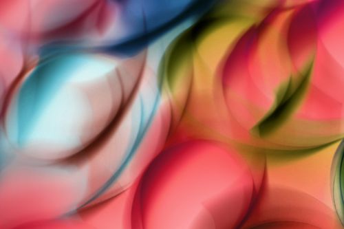 Free Vibrant abstract art featuring swirling colors creating a dynamic and energetic composition. Stock Photo