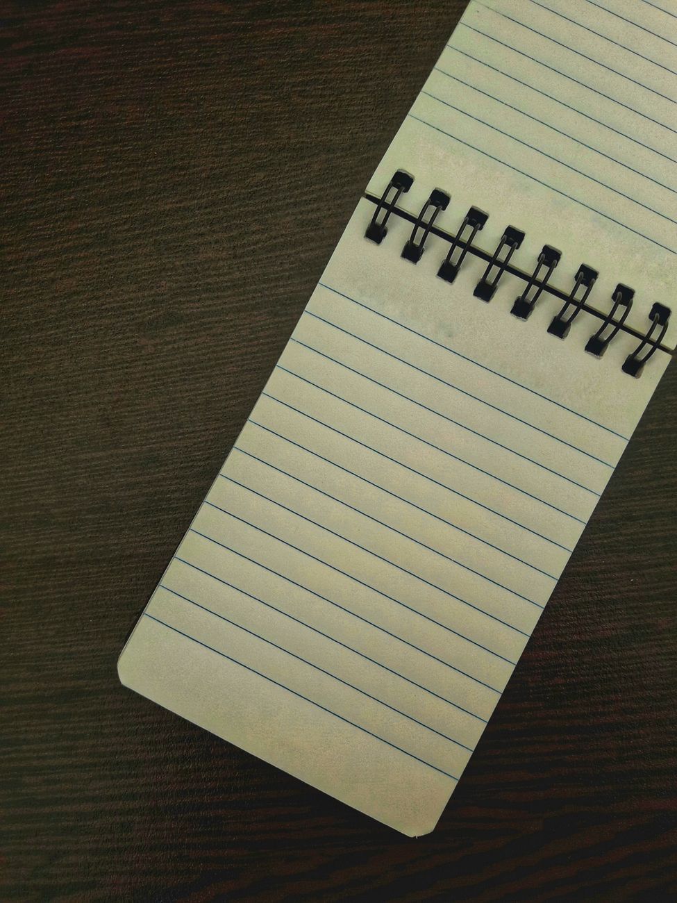 A workshop notebook with handwritten code annotations