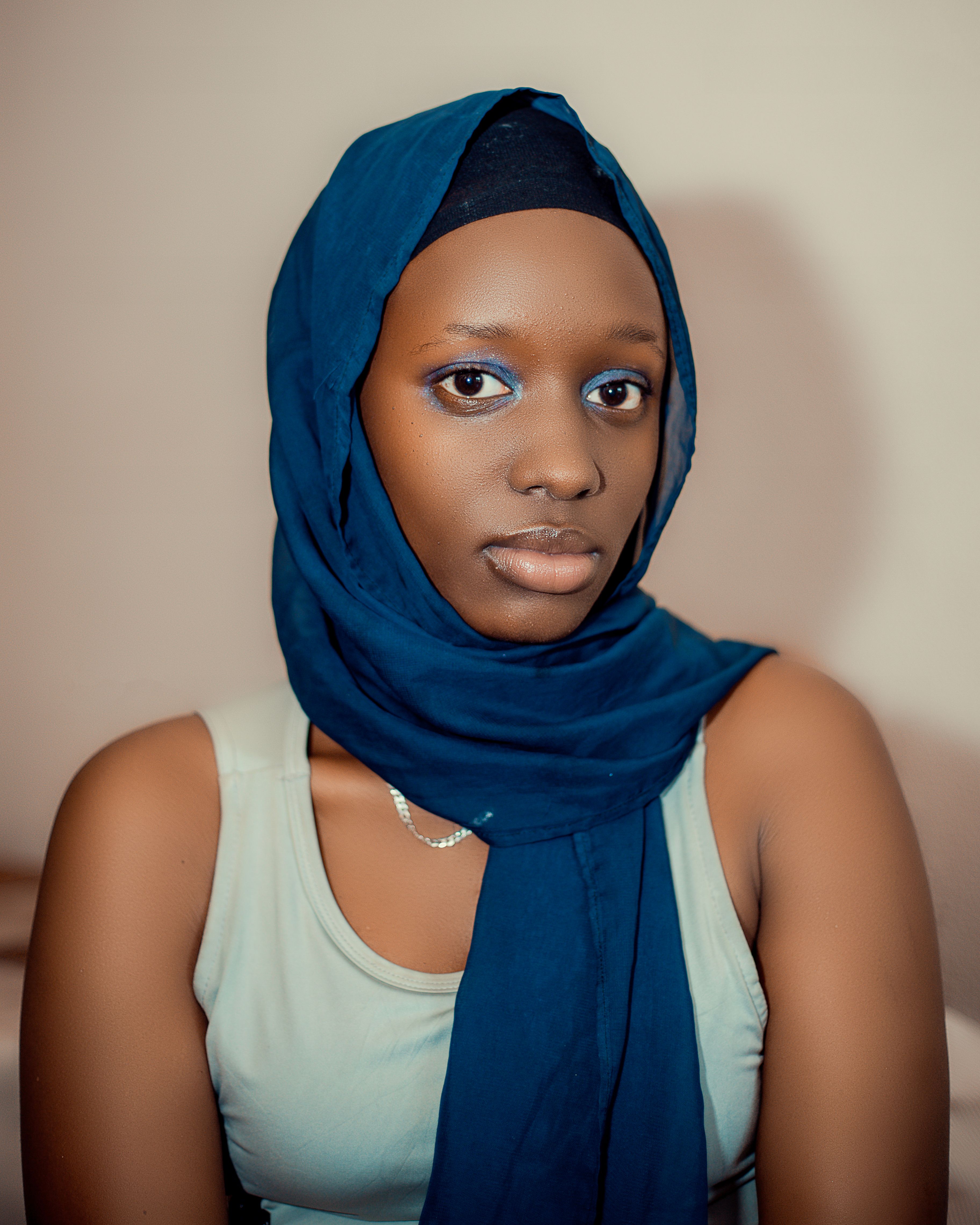 Elegant Portrait of a Woman in Blue Hijab · Free Stock Photo