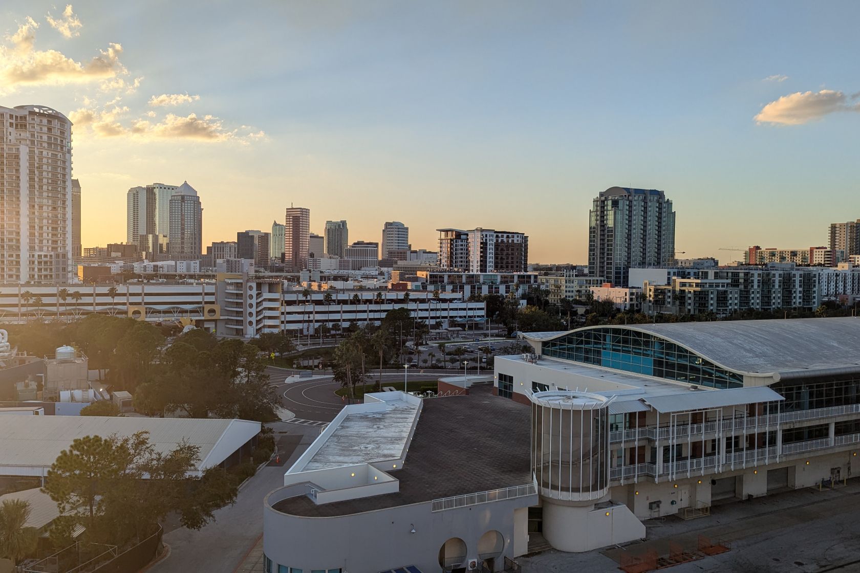 A stunning view of Tampa skyline at sunset, highlighting modern architecture and urban landscape.