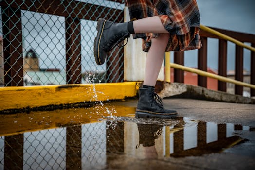 A youthful vibe of boots splashing on a rainy urban day in Savannah.