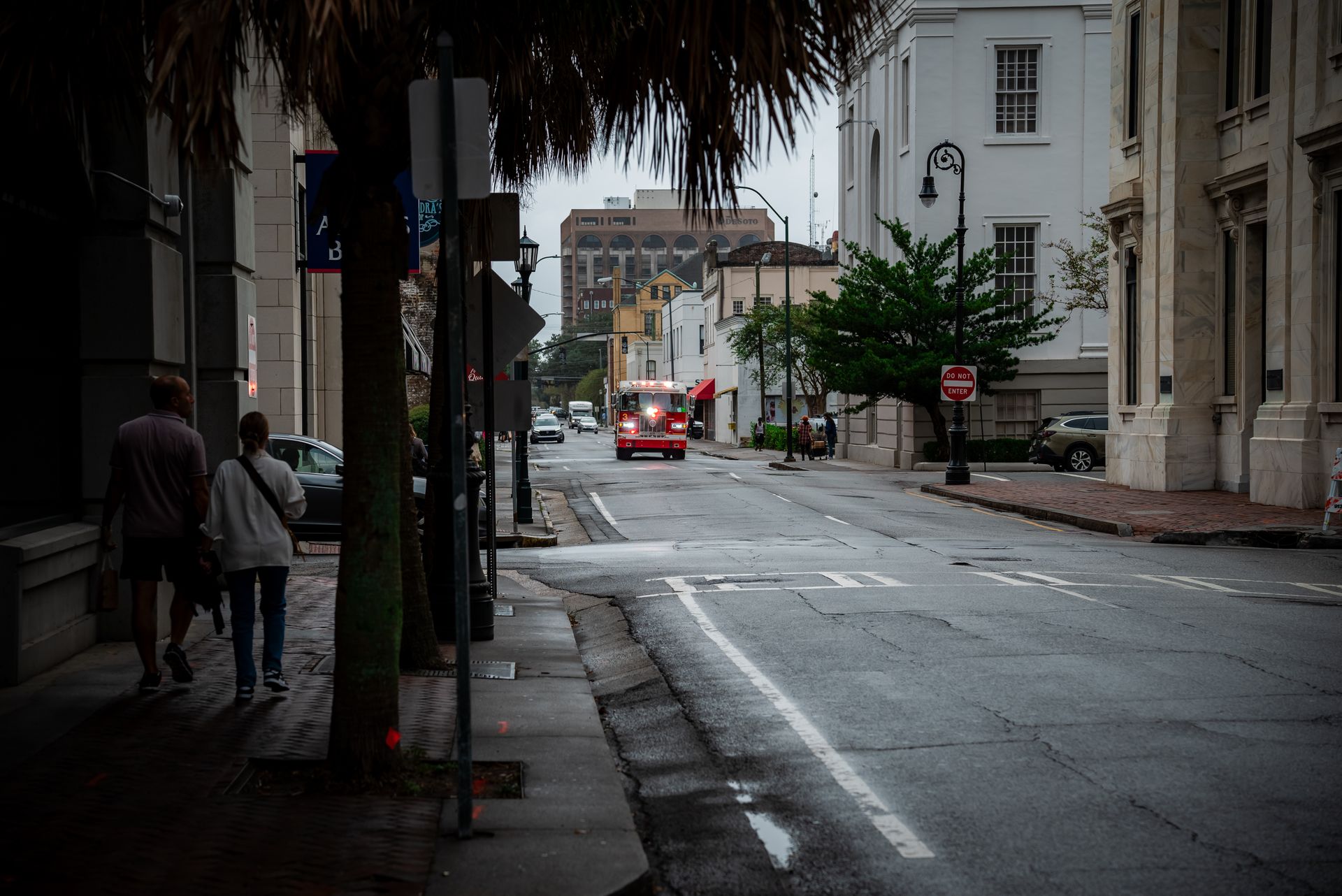A fire truck responding to an emergency on a street in Savannah, Georgia, USA.