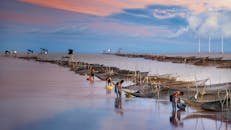 Men Preparing Their Boats for Fishing