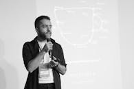 Man Presenting Pitch Deck in Seminar