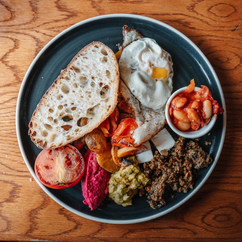 Baked Eggs with Sausage and Bread Cubes