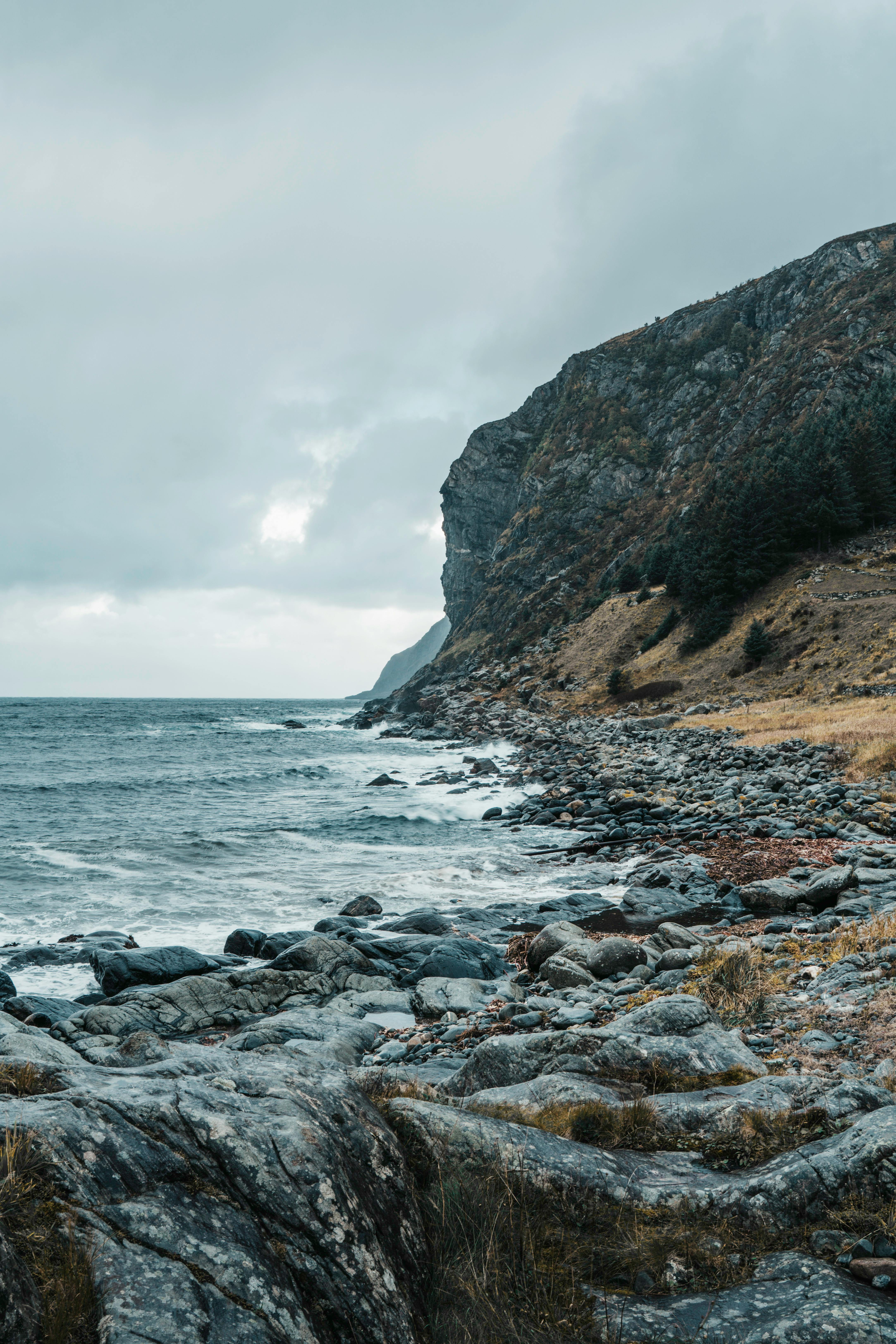 dramatic norwegian coastal cliffs and ocean scene