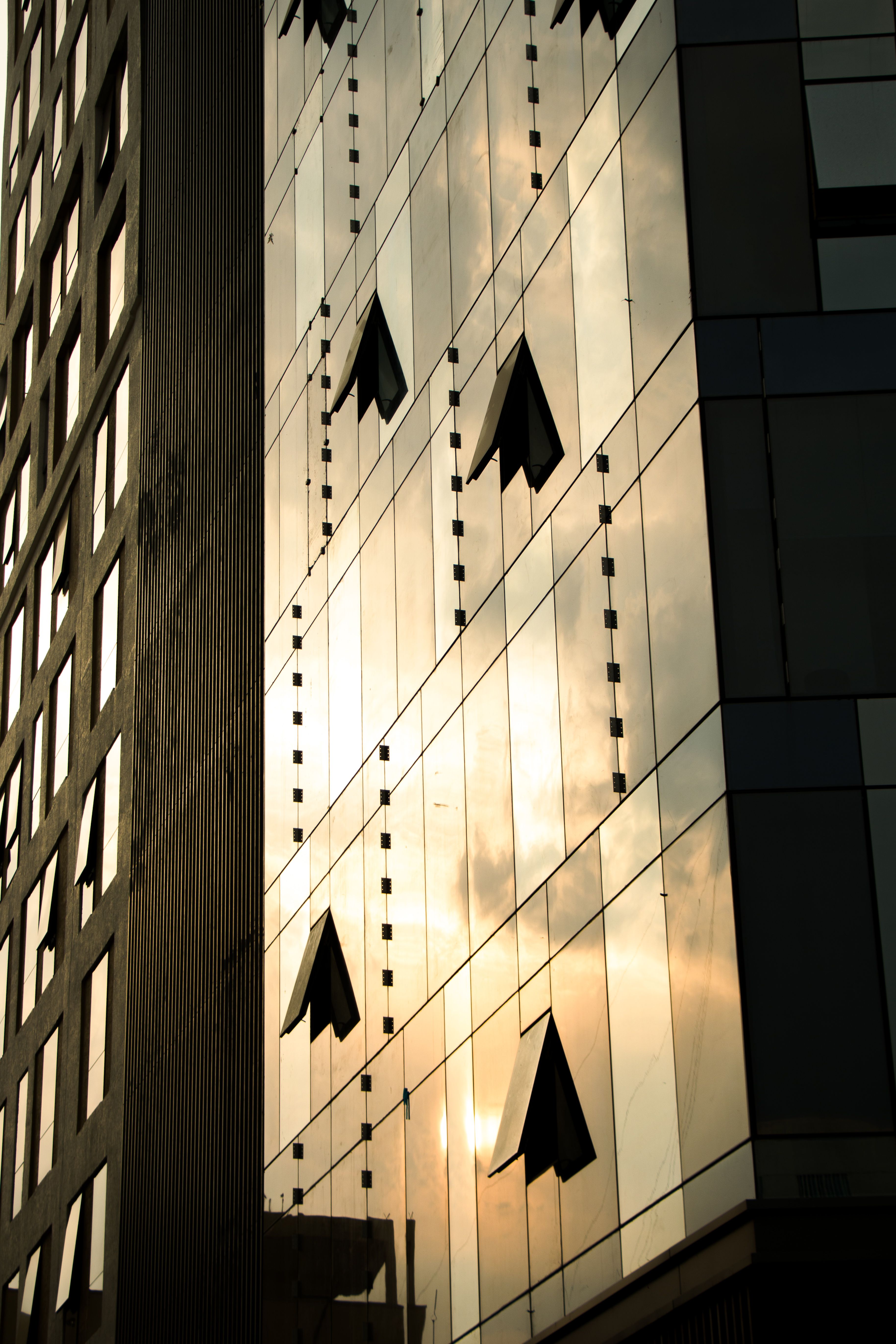 Modern Building Facade at Sunset Reflection · Free Stock Photo