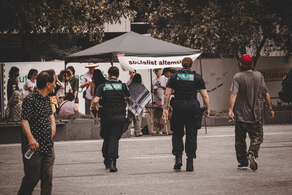 Police officers monitoring a protest in Brisbane City, Australia.