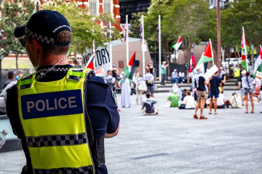Australia police shooting suspect named as manhunt continues