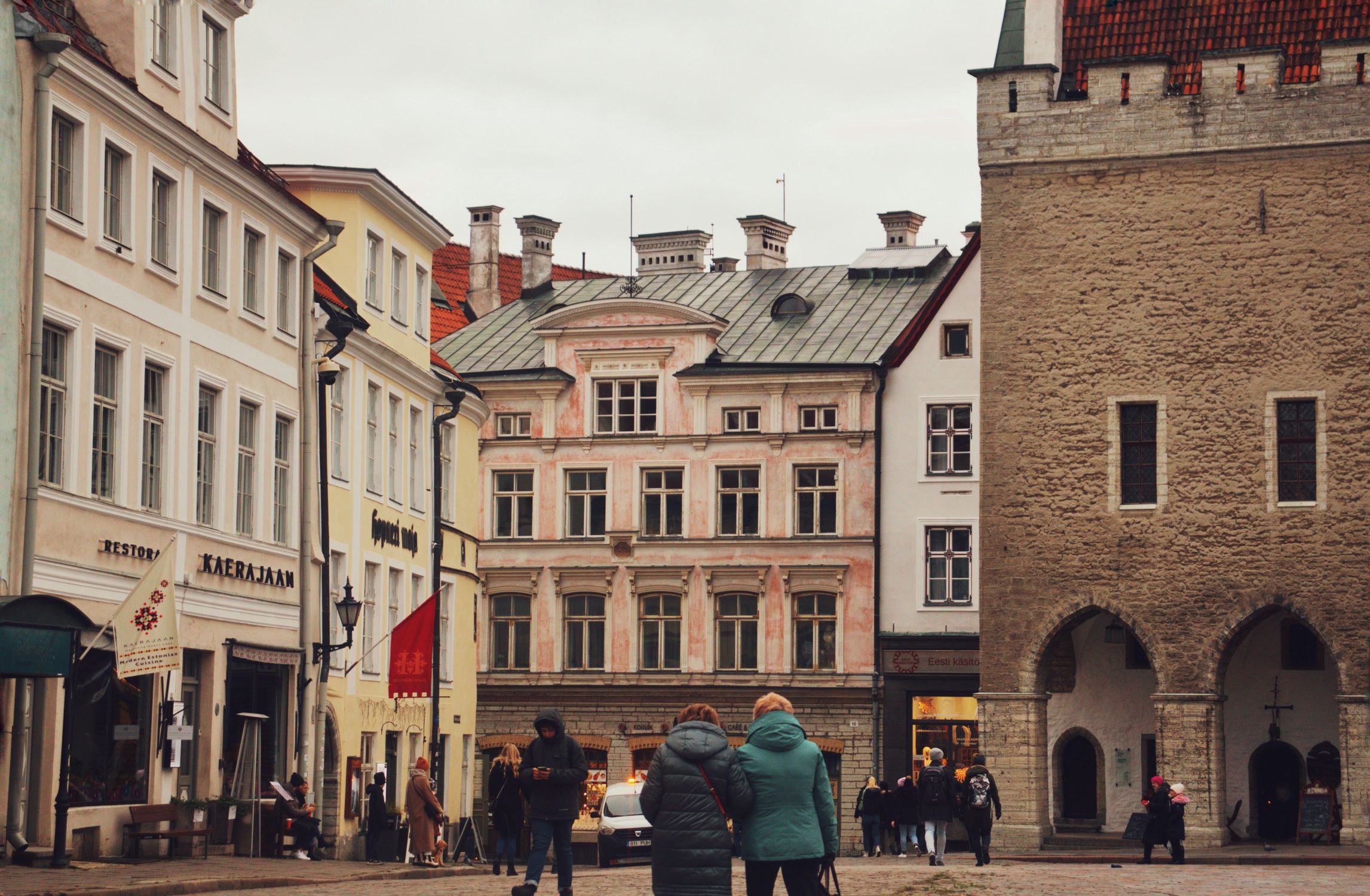 Charming street view of historic buildings in Tallinn's Old Town, Estonia.