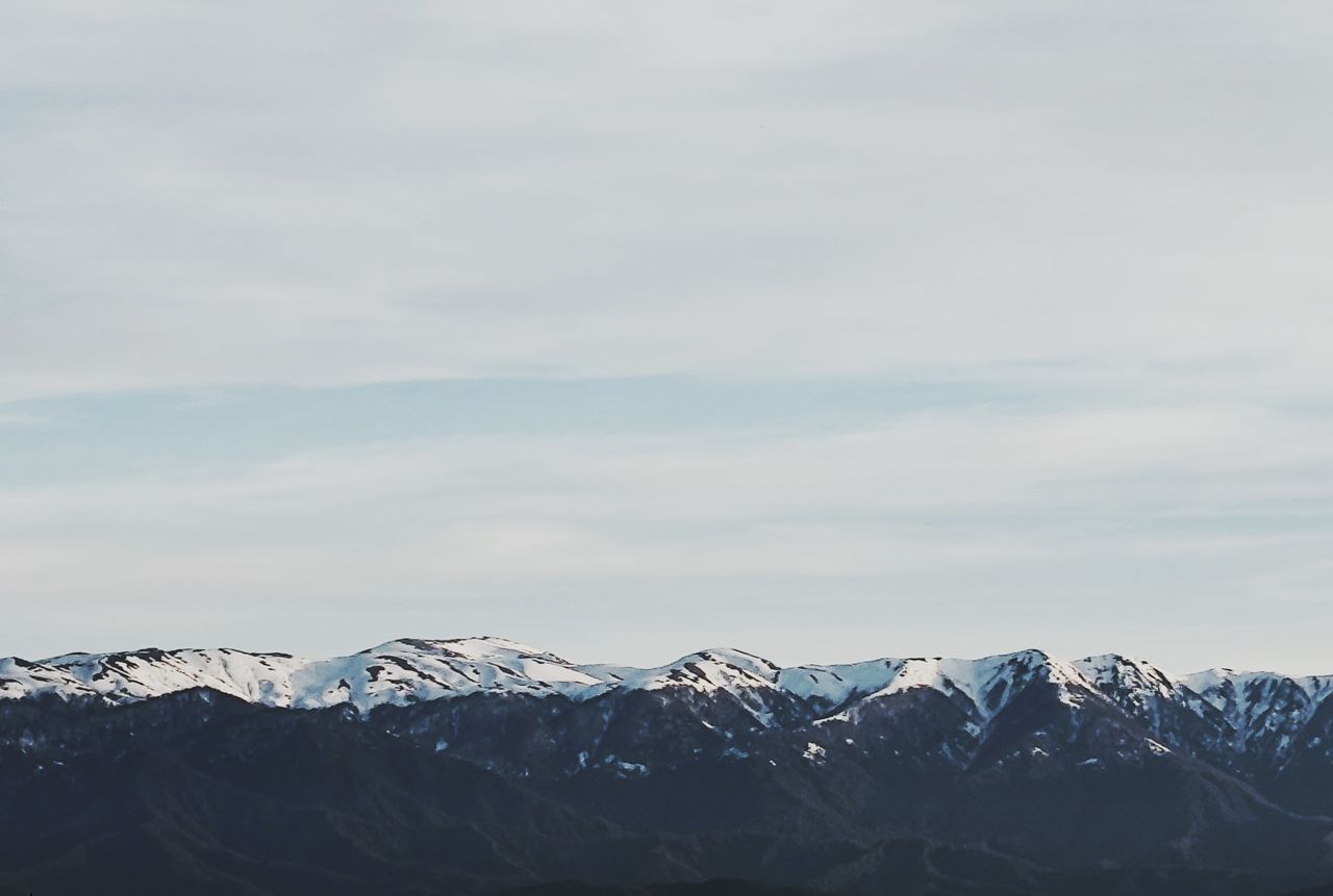 snow covered caucasus mountains in georgia under a vast blue sky a bre