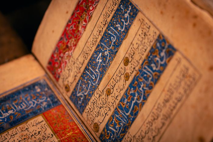 An illuminated manuscript page with hand-drawn ornament — photo by mohamed abdelghaffar on Pexels