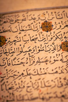 Detailed view of an ancient Arabic manuscript with intricate calligraphy.