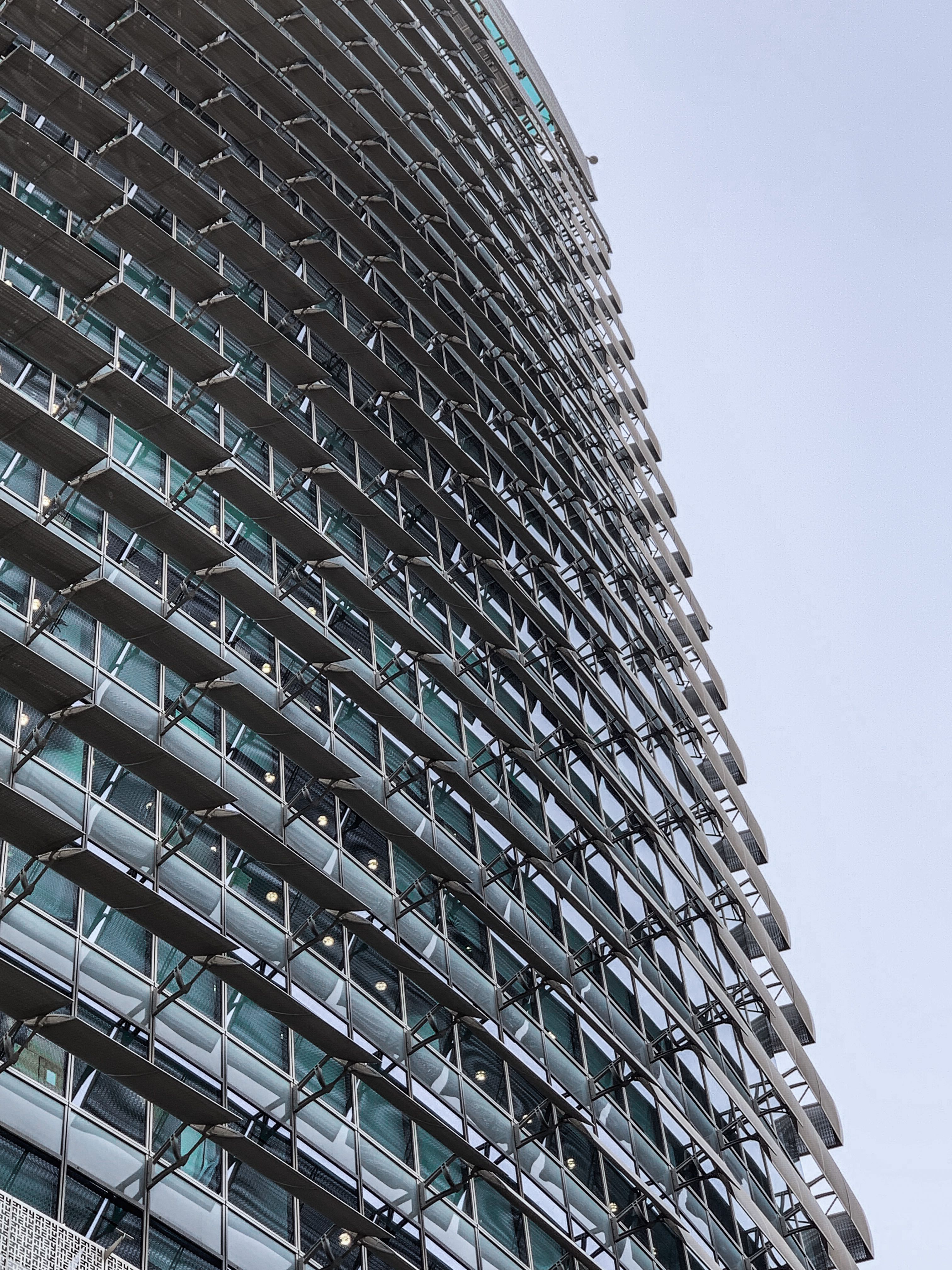 Modern Skyscraper with Glass Facade · Free Stock Photo