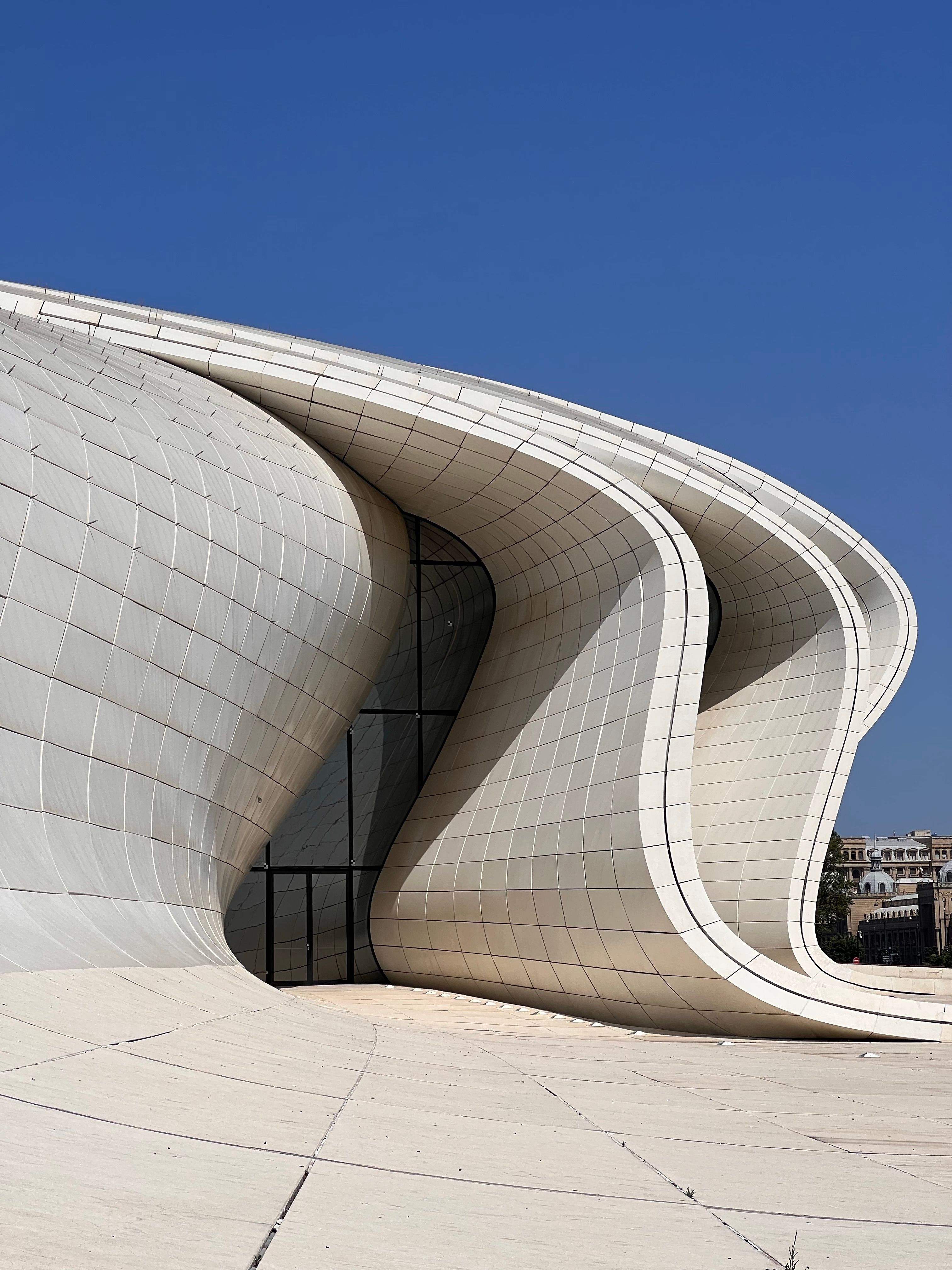 Modern Architectural Design with Curved Facade · Free Stock Photo