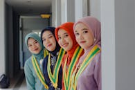 Graduation Ceremony with Smiling Students in Hijabs