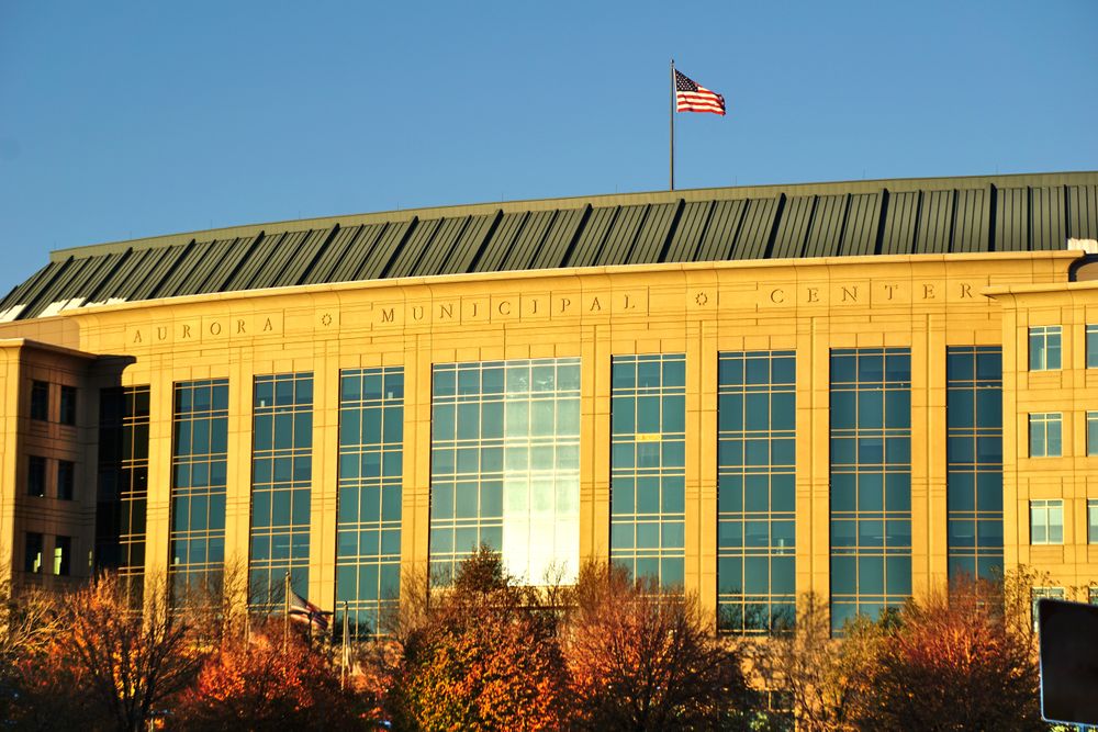 Municipal government building with an American flag