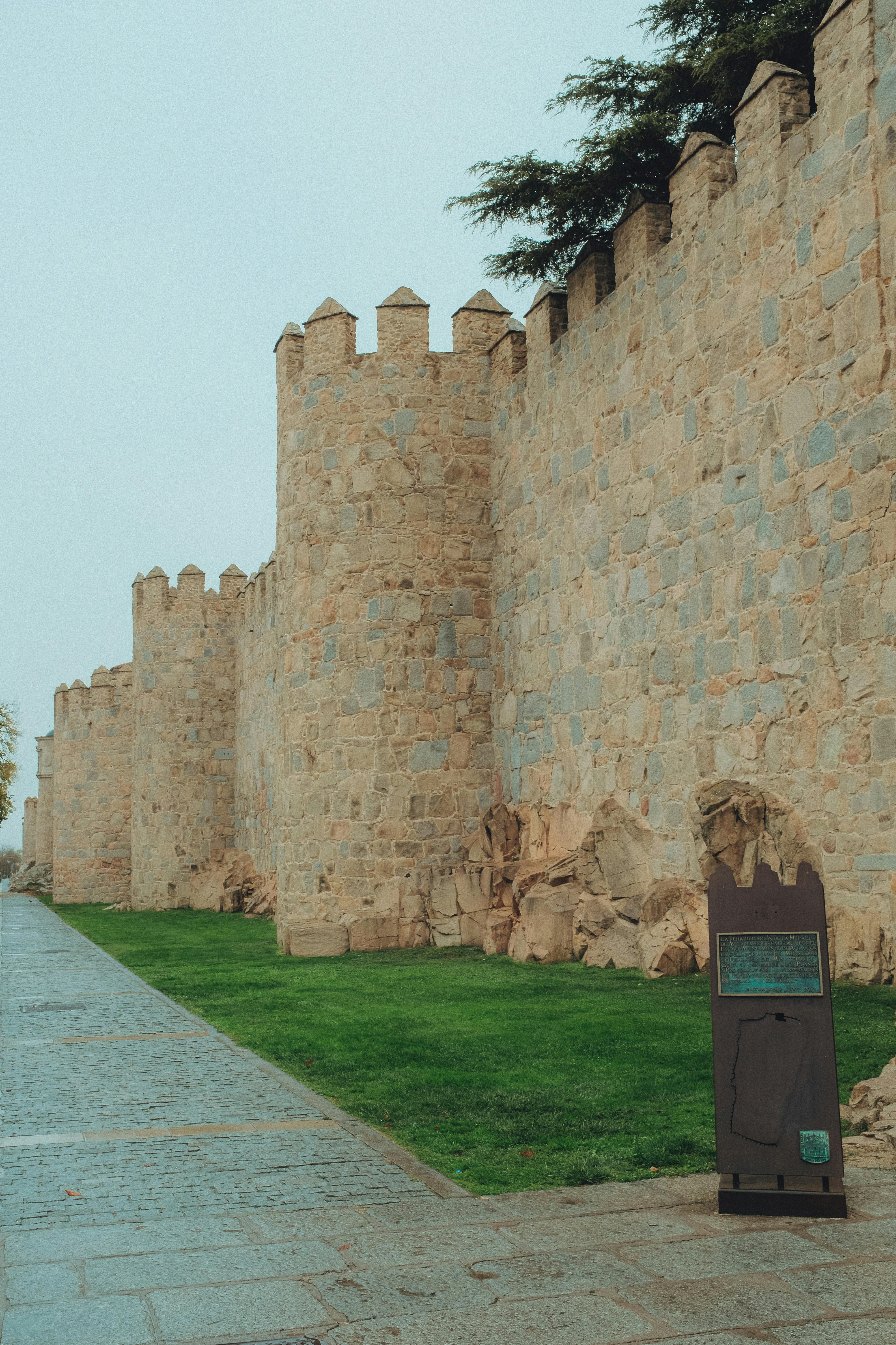 View of the historic stone walls of Ávila, a World Heritage site in Spain.