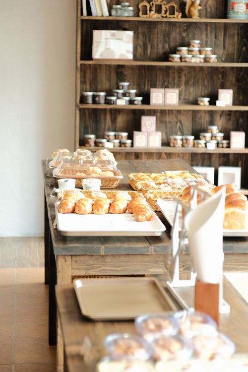 Free A cozy Hồ Chí Minh bakery showcases freshly baked croissants and pastries. Stock Photo