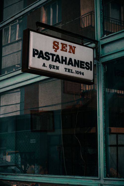 Free stock photo of hanging signs, old signage, pastry shop Stock Photo