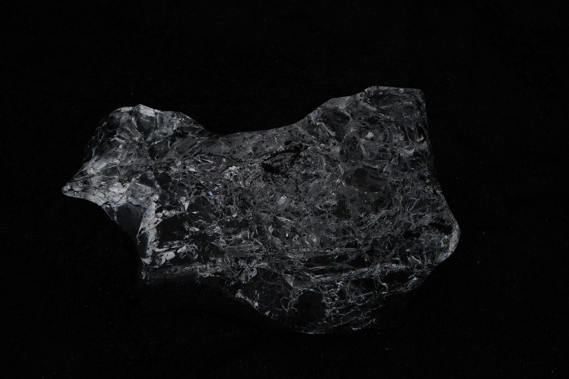 polished black obsidian stone for deep grounding and emotional release